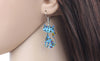 Image of Acrylic Cartoon Floral Smile Cat Kitten Earrings